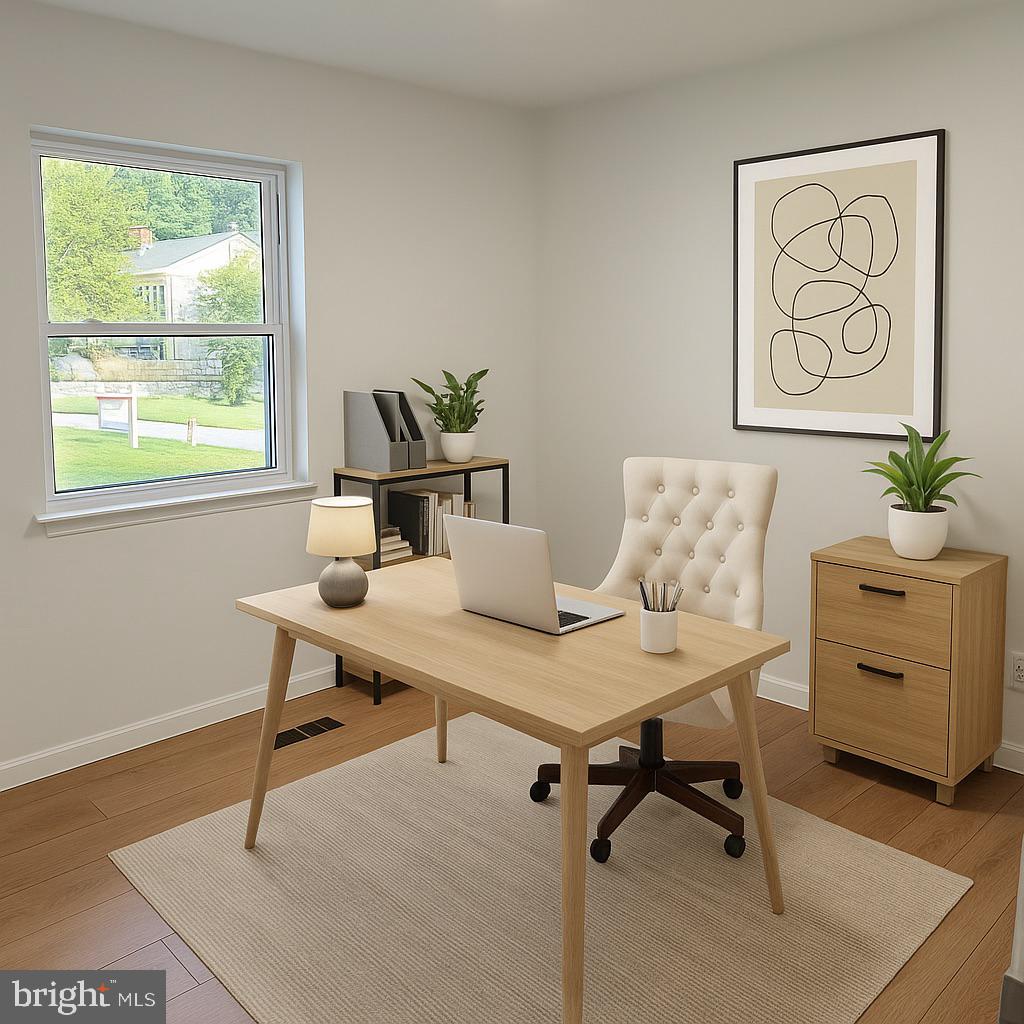 3600 4th Street North Beach, MD 20714 - Photo 24 of 32 a view of a workspace with furniture