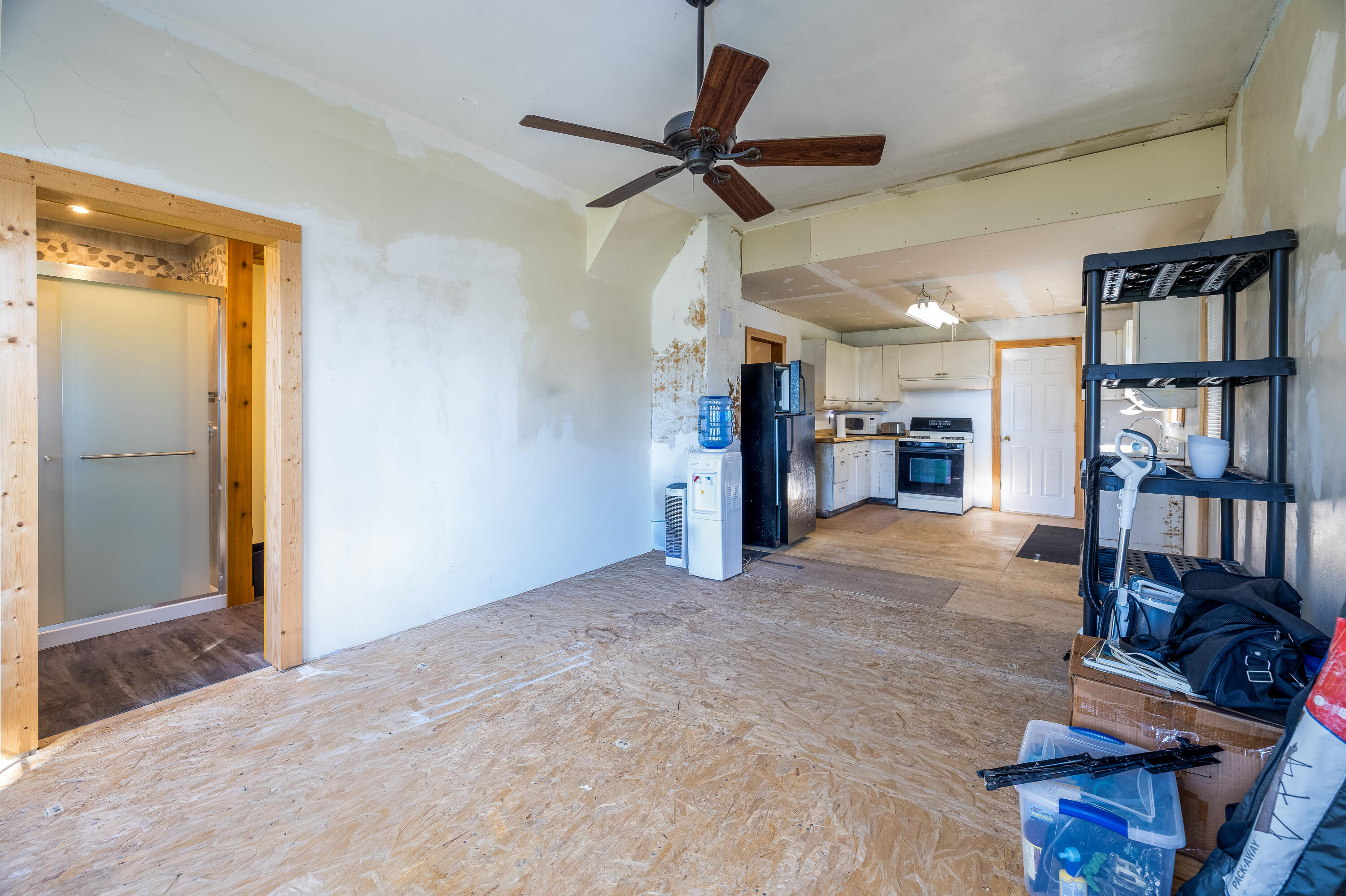408 East Graham Street Kentland, IN 47951 - Photo 16 of 30 a view of a livingroom with furniture and a ceiling fan