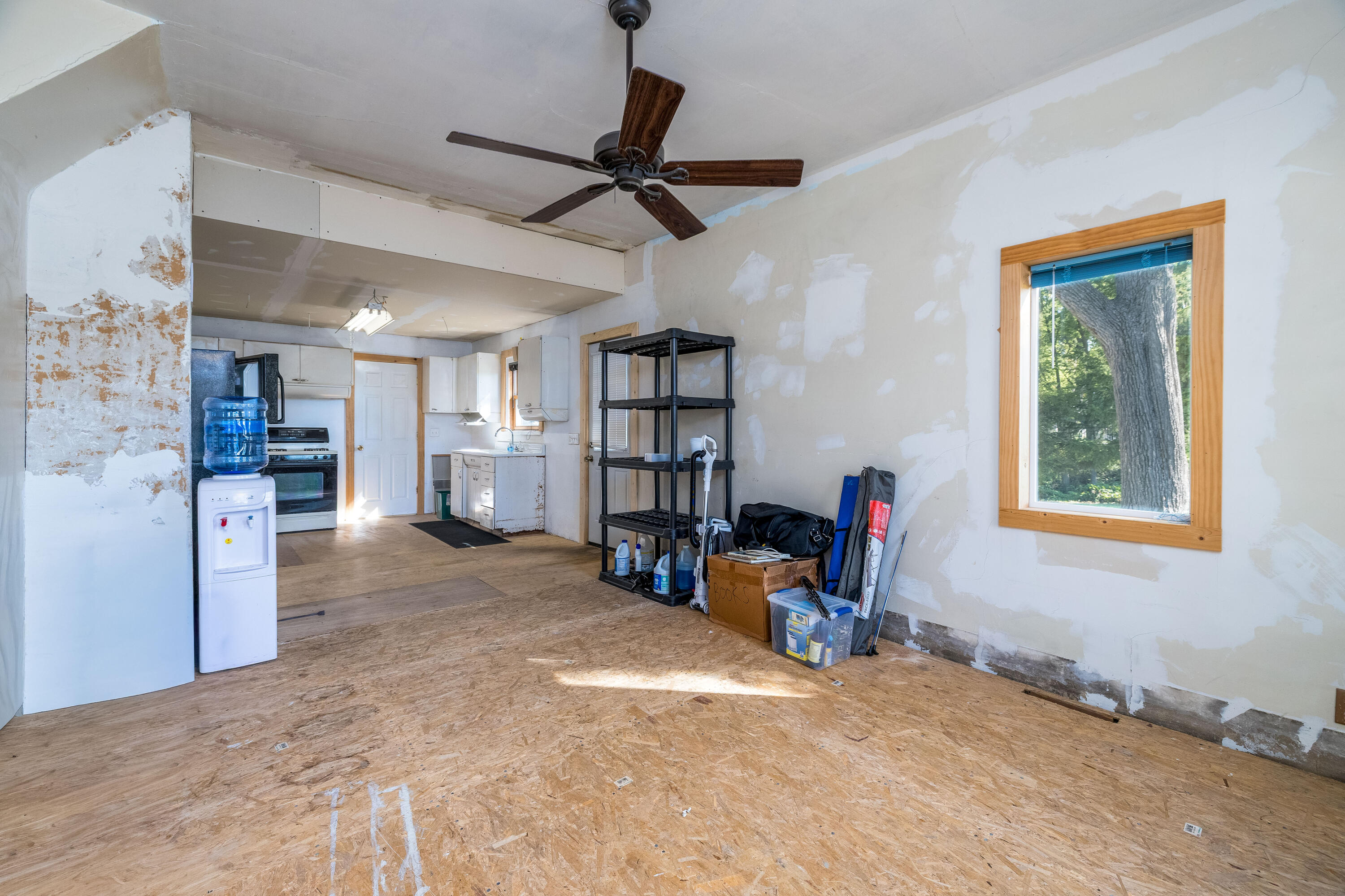 408 East Graham Street Kentland, IN 47951 - Photo 17 of 30 a view of a livingroom with furniture and a ceiling fan