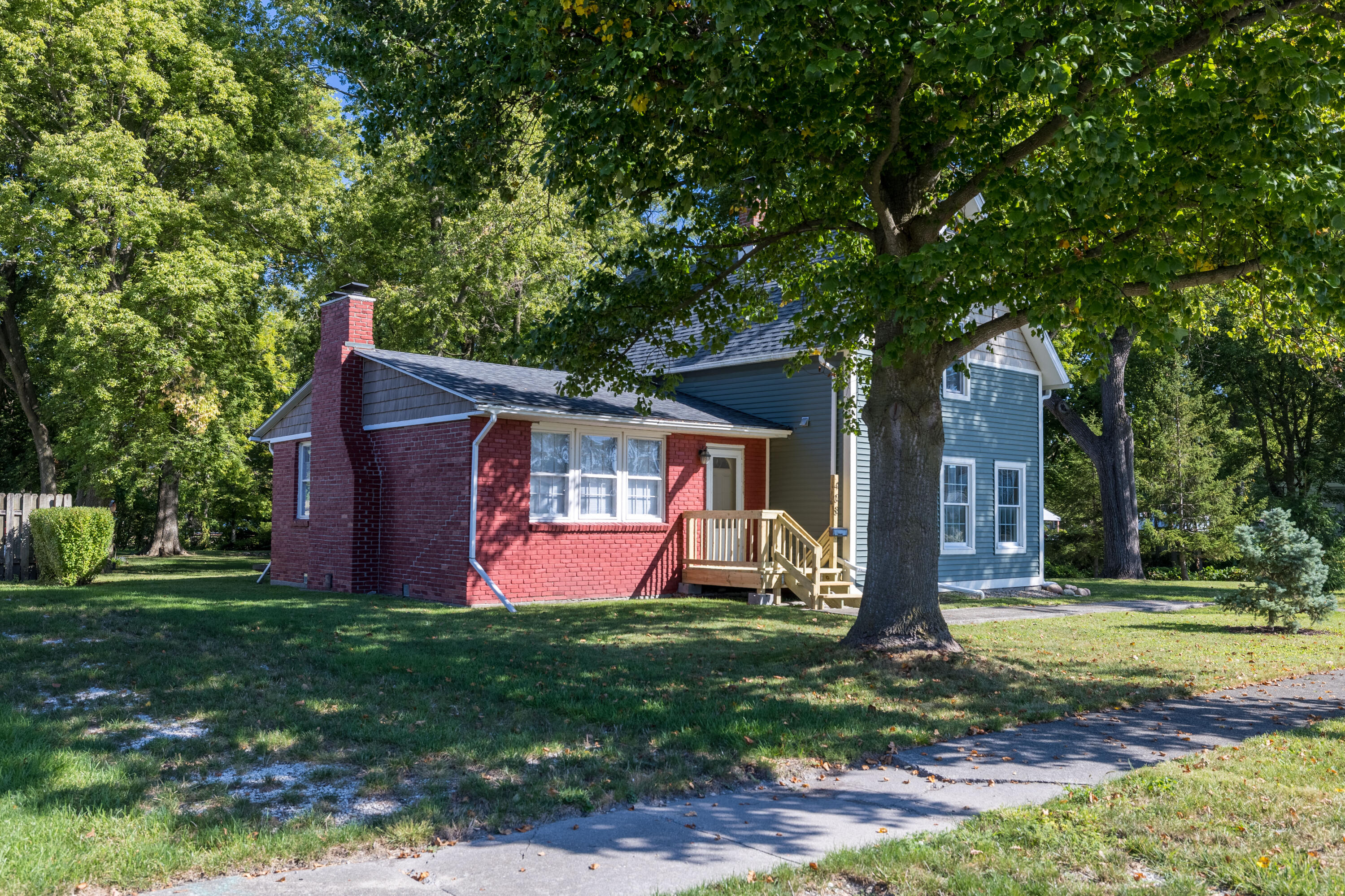408 East Graham Street Kentland, IN 47951 - Photo 2 of 30 a front view of house with yard and green space