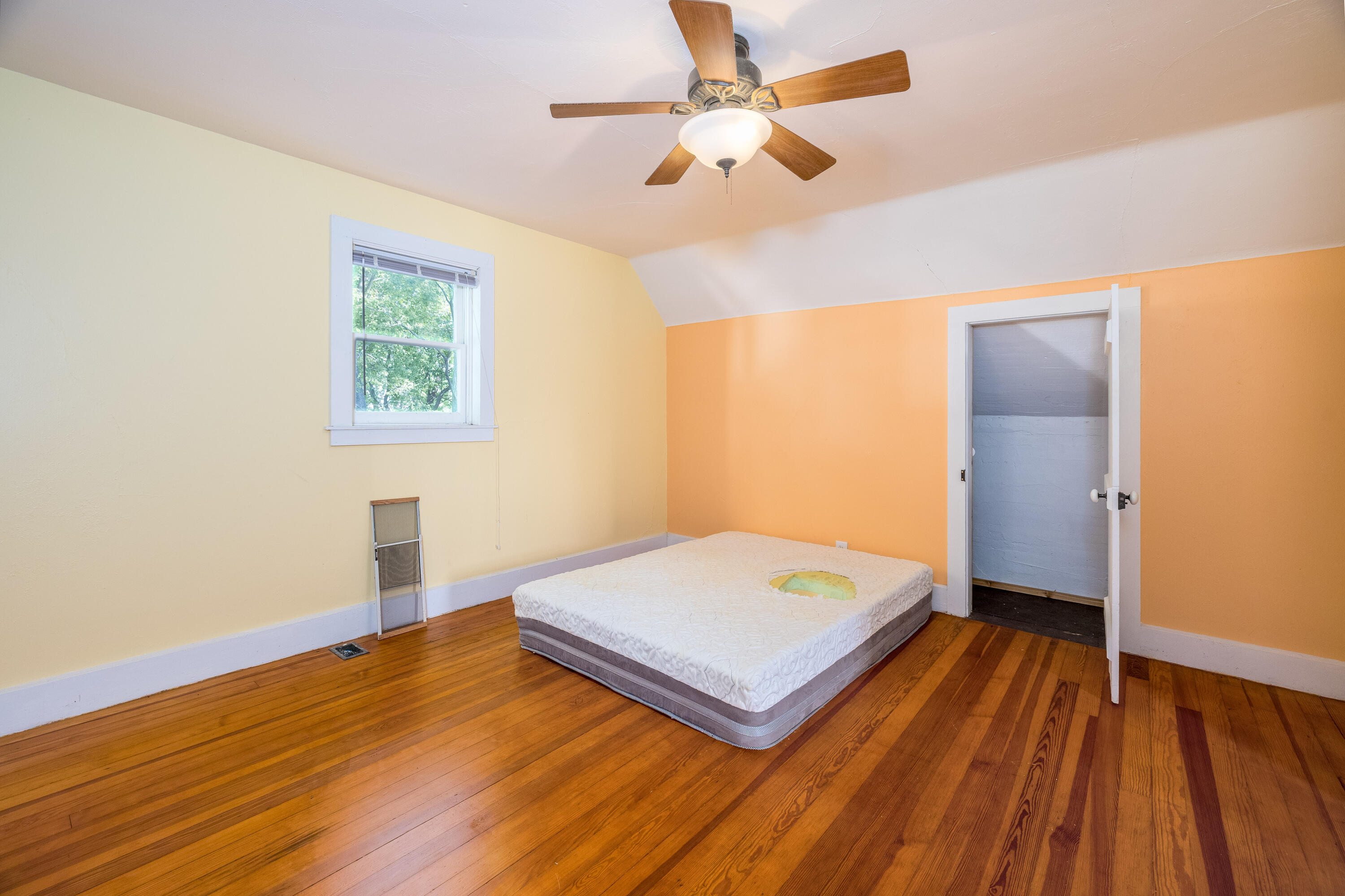 408 East Graham Street Kentland, IN 47951 - Photo 26 of 30 a view of an empty room with wooden floor