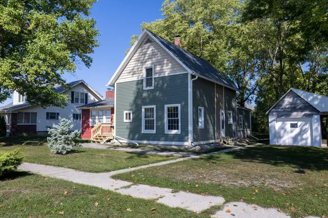 a front view of house with yard