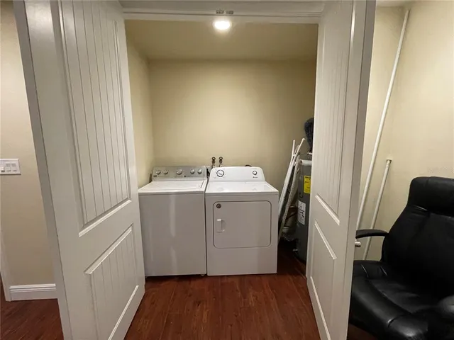 a utility room with a sink a washer and dryer