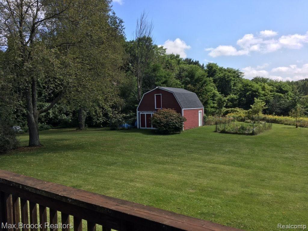 9895 Rattalee Lake Road Clarkston, MI 48348 - Photo 21 of 34 Large barn has several access doors...storage opportunity or how about a horse or two?