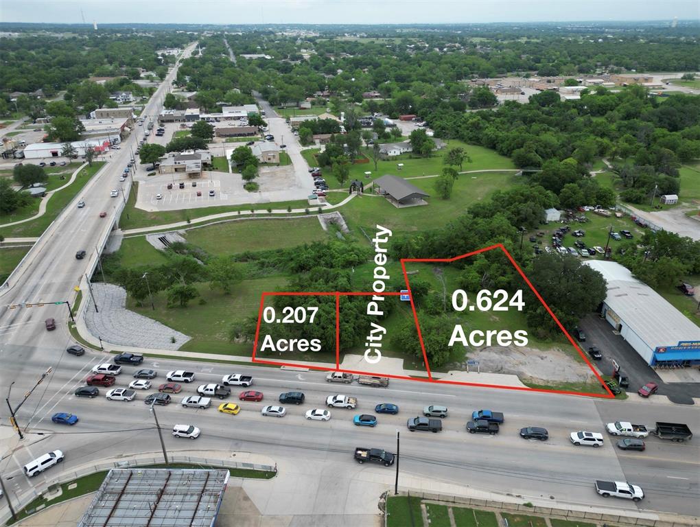 116 East Highway 199 Springtown, TX 76082 - Photo 2 of 15 Two parcels of land totaling 0.831 acres, featuring direct road frontage and surrounded by established commercial and residential areas