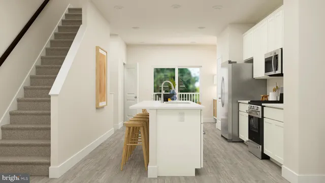 a kitchen with a refrigerator and a stove