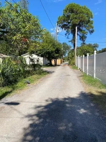 a view of a street with a building