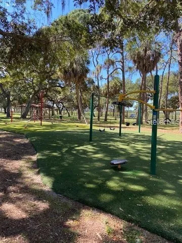 a garden view with a fountain