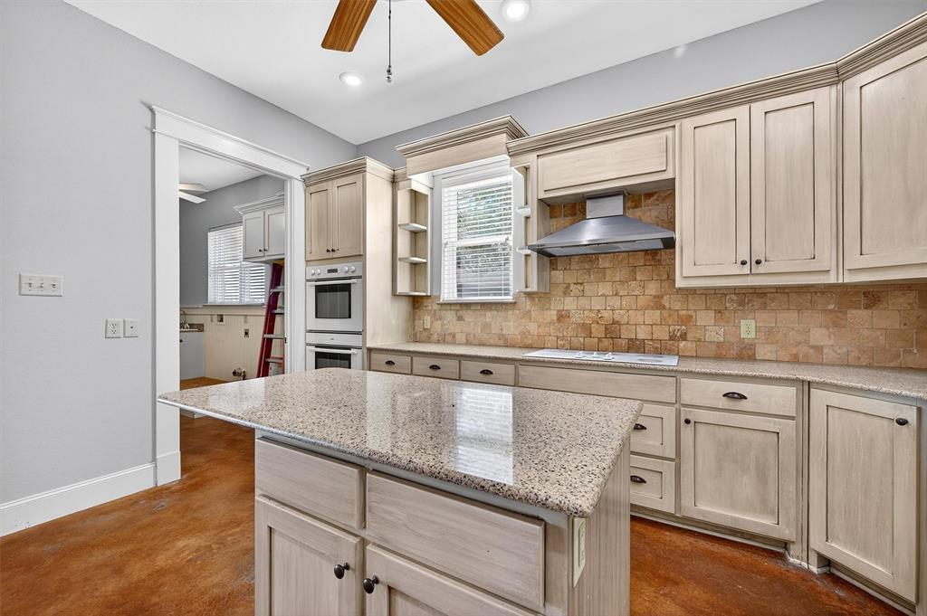 2166 Old Southmayd Road Sherman, TX 75092 - Photo 15 of 40 a kitchen with stainless steel appliances granite countertop a sink and cabinets