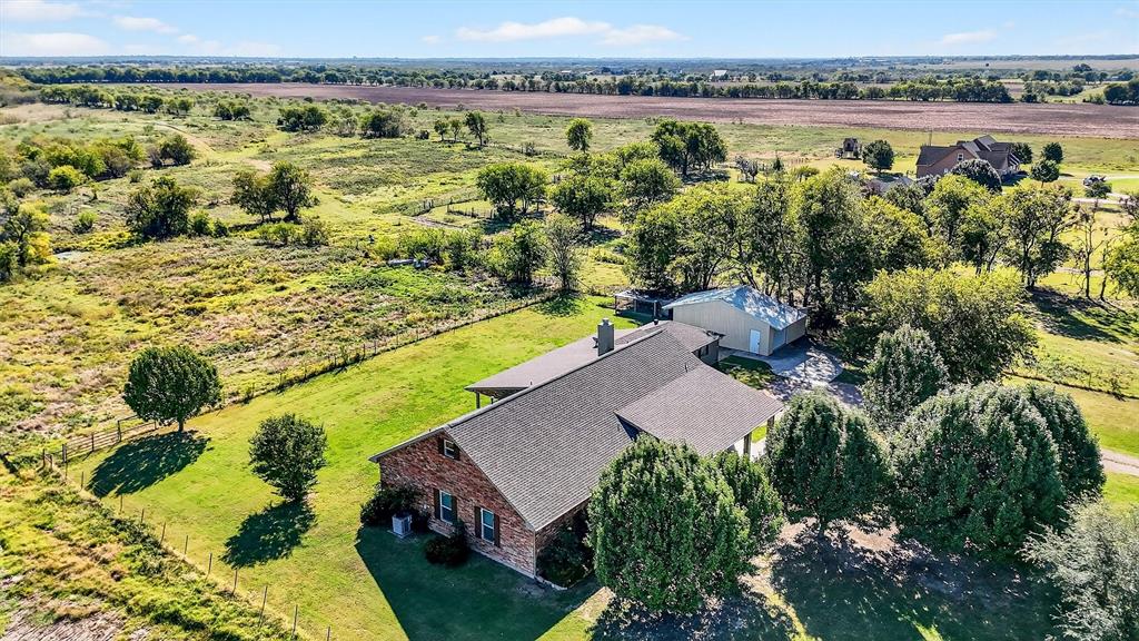 2166 Old Southmayd Road Sherman, TX 75092 - Photo 2 of 40 an aerial view of residential houses with outdoor space