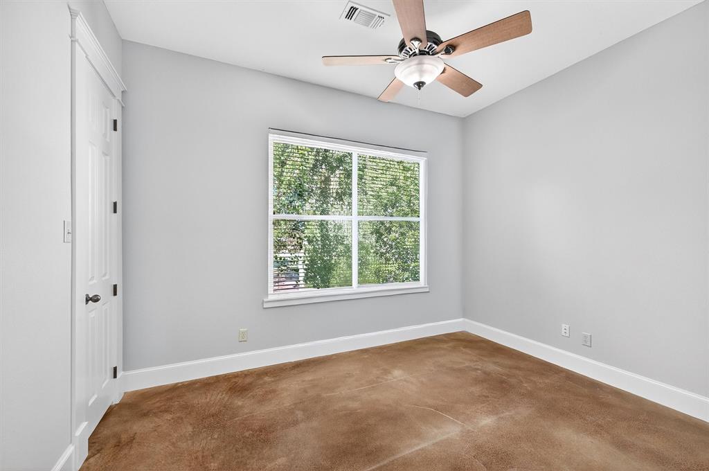 2166 Old Southmayd Road Sherman, TX 75092 - Photo 21 of 40 an empty room with a window and a fan