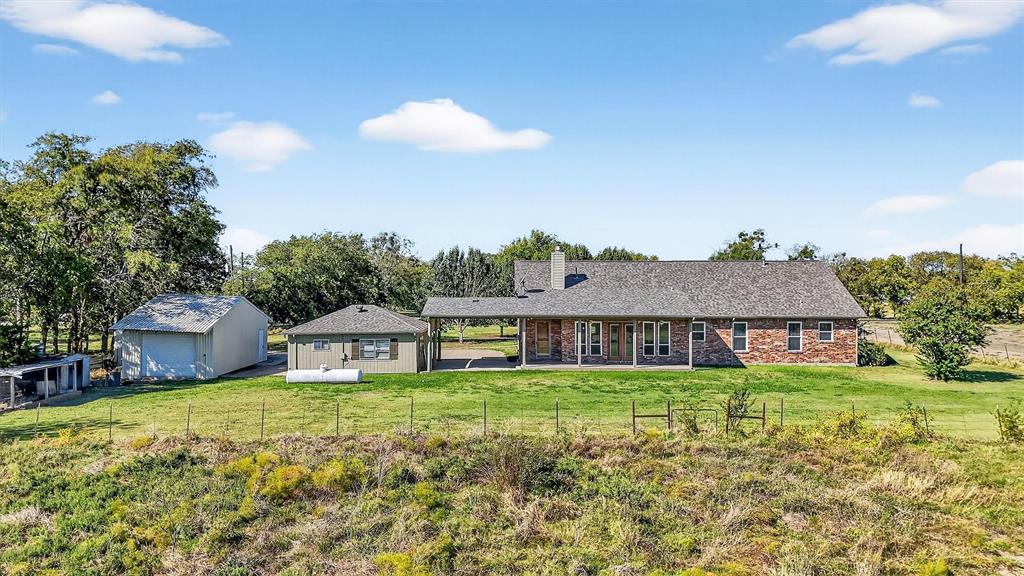 2166 Old Southmayd Road Sherman, TX 75092 - Photo 31 of 40 a house view with a garden space