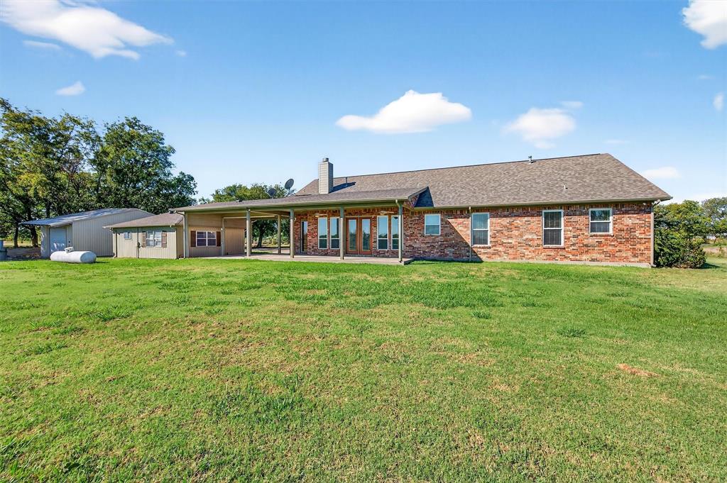 2166 Old Southmayd Road Sherman, TX 75092 - Photo 32 of 40 a front view of house with yard and green space