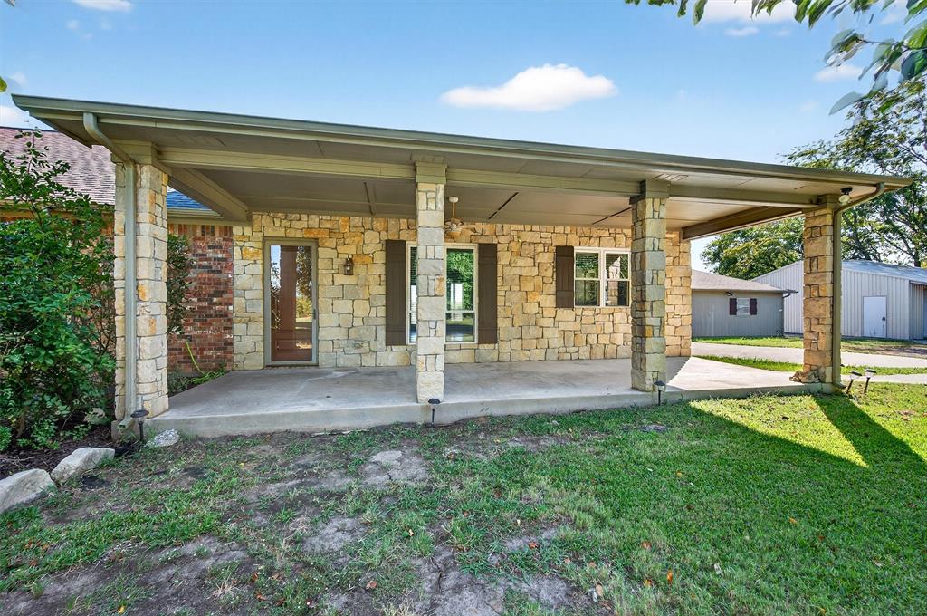 2166 Old Southmayd Road Sherman, TX 75092 - Photo 6 of 40 a view of a porch with a backyard