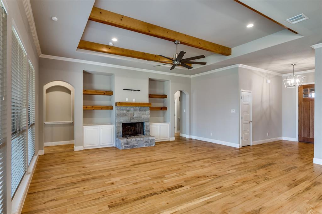 14717 Lost Wagon Street Justin, TX 76247 - Photo 9 of 37 a view of a livingroom with a fireplace