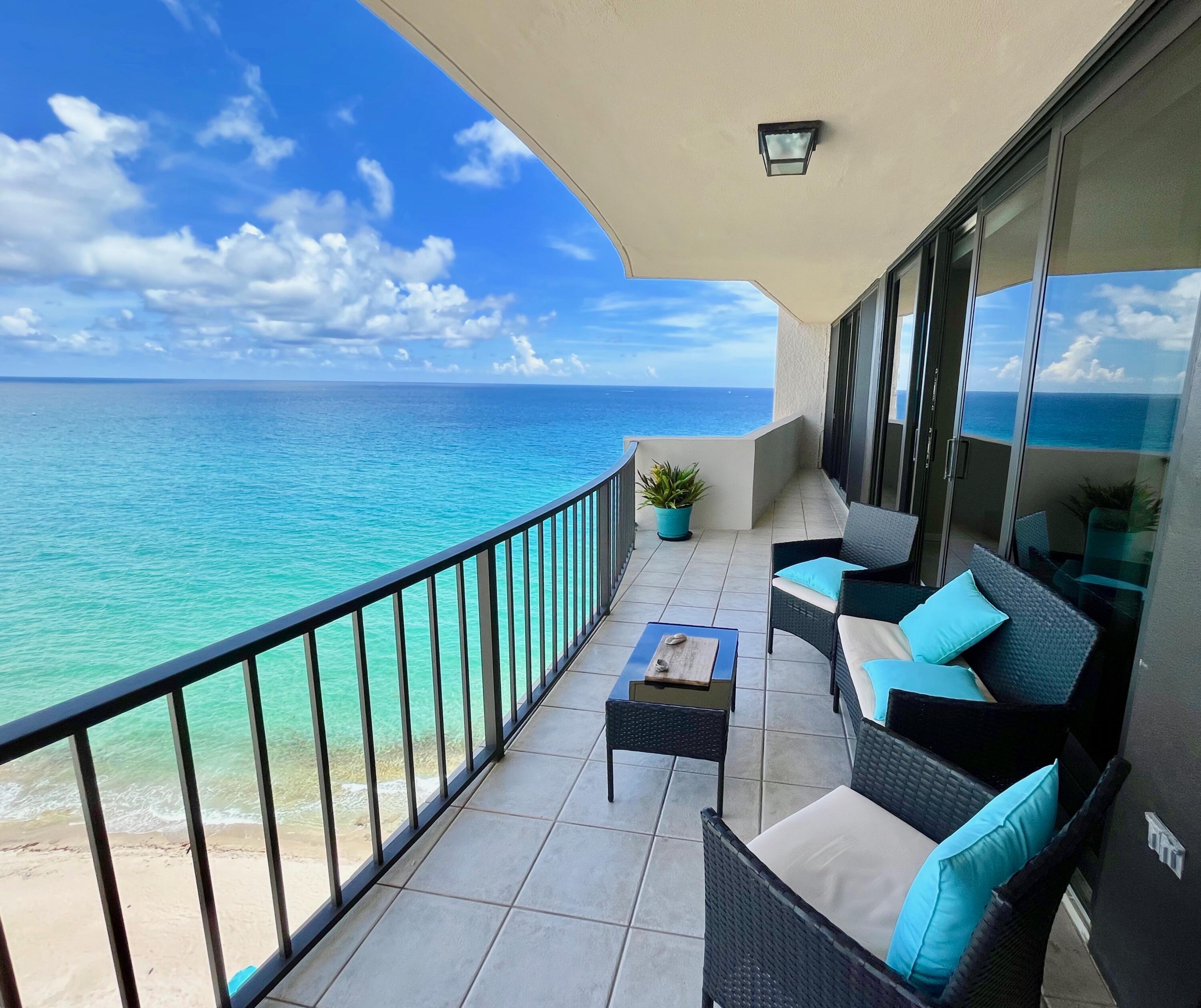 a view of balcony with furniture