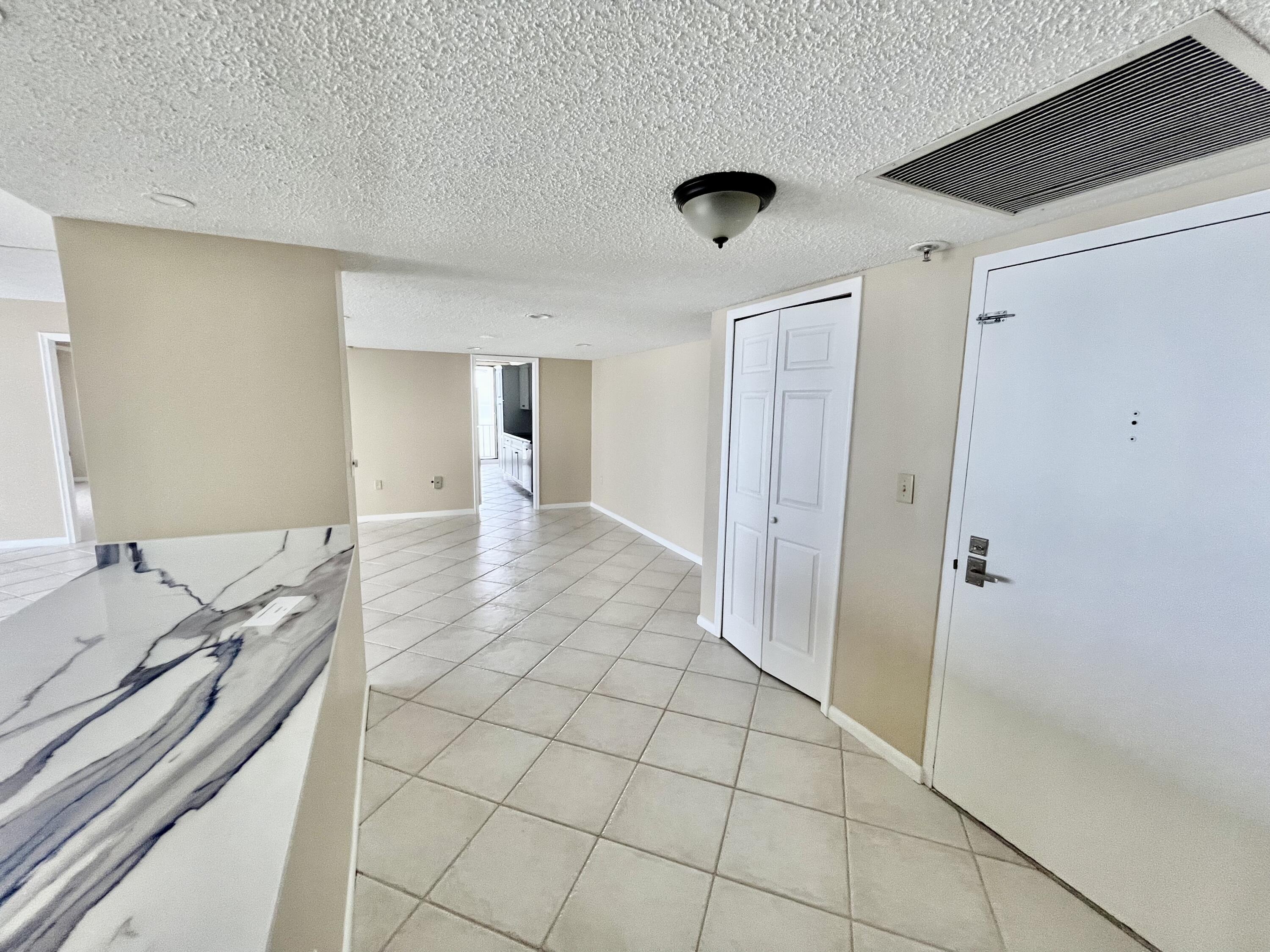 4200 North Ocean Drive, Unit 11601 Singer Island, FL 33404 - Photo 14 of 56 a bathroom with a sink and a mirror