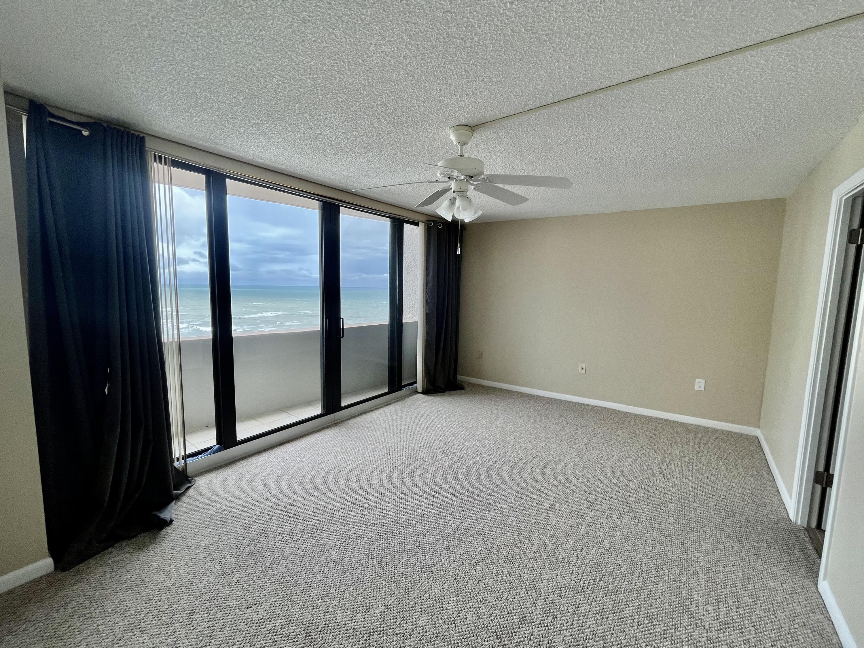 4200 North Ocean Drive, Unit 11601 Singer Island, FL 33404 - Photo 19 of 56 a view of an empty room with a window