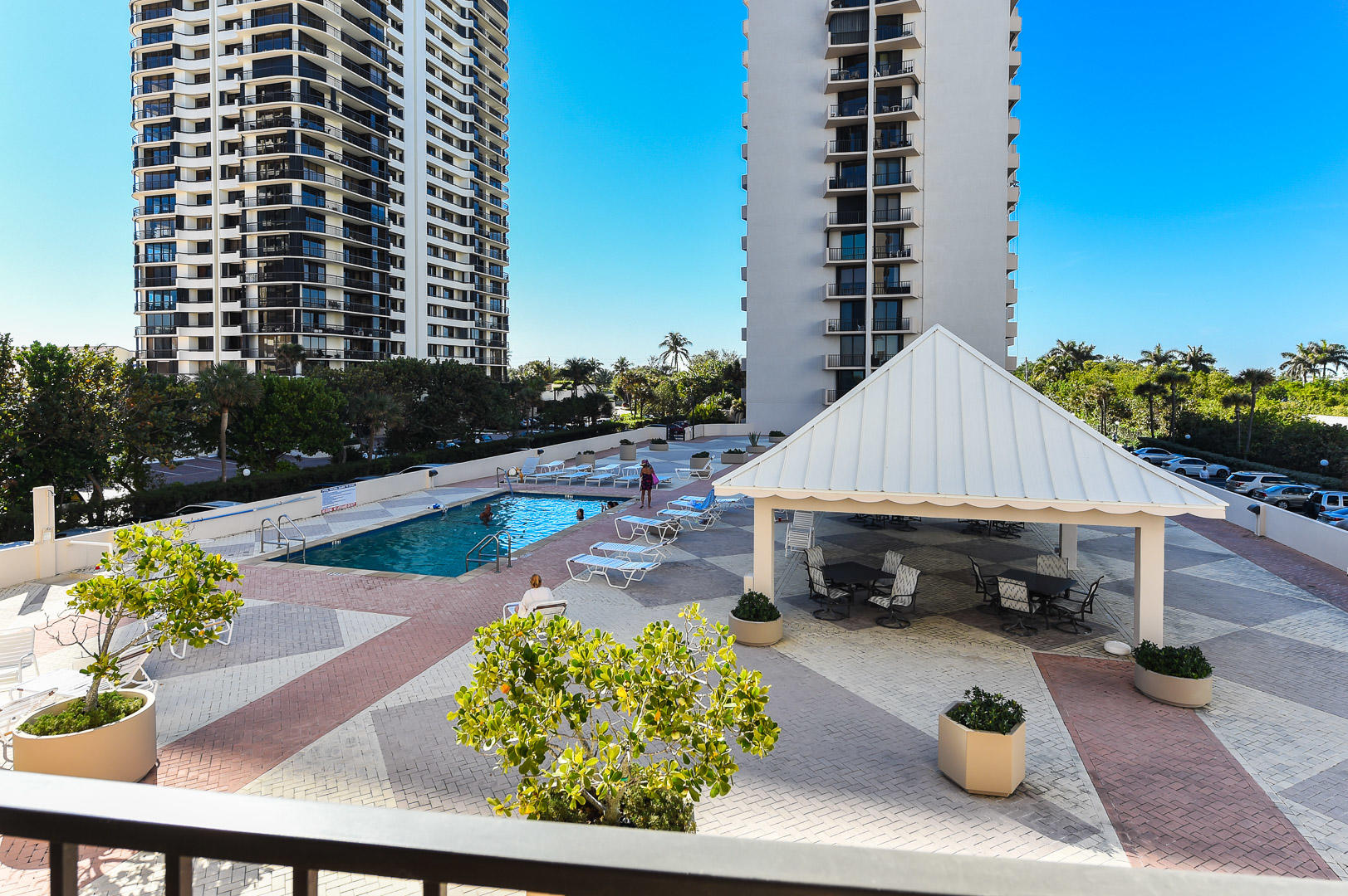 4200 North Ocean Drive, Unit 11601 Singer Island, FL 33404 - Photo 38 of 56 a view of backyard with a table and chairs and potted plants
