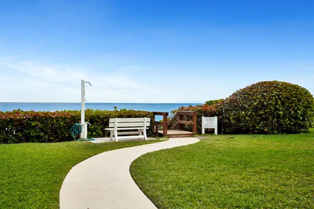 a view of a street with tall buildings