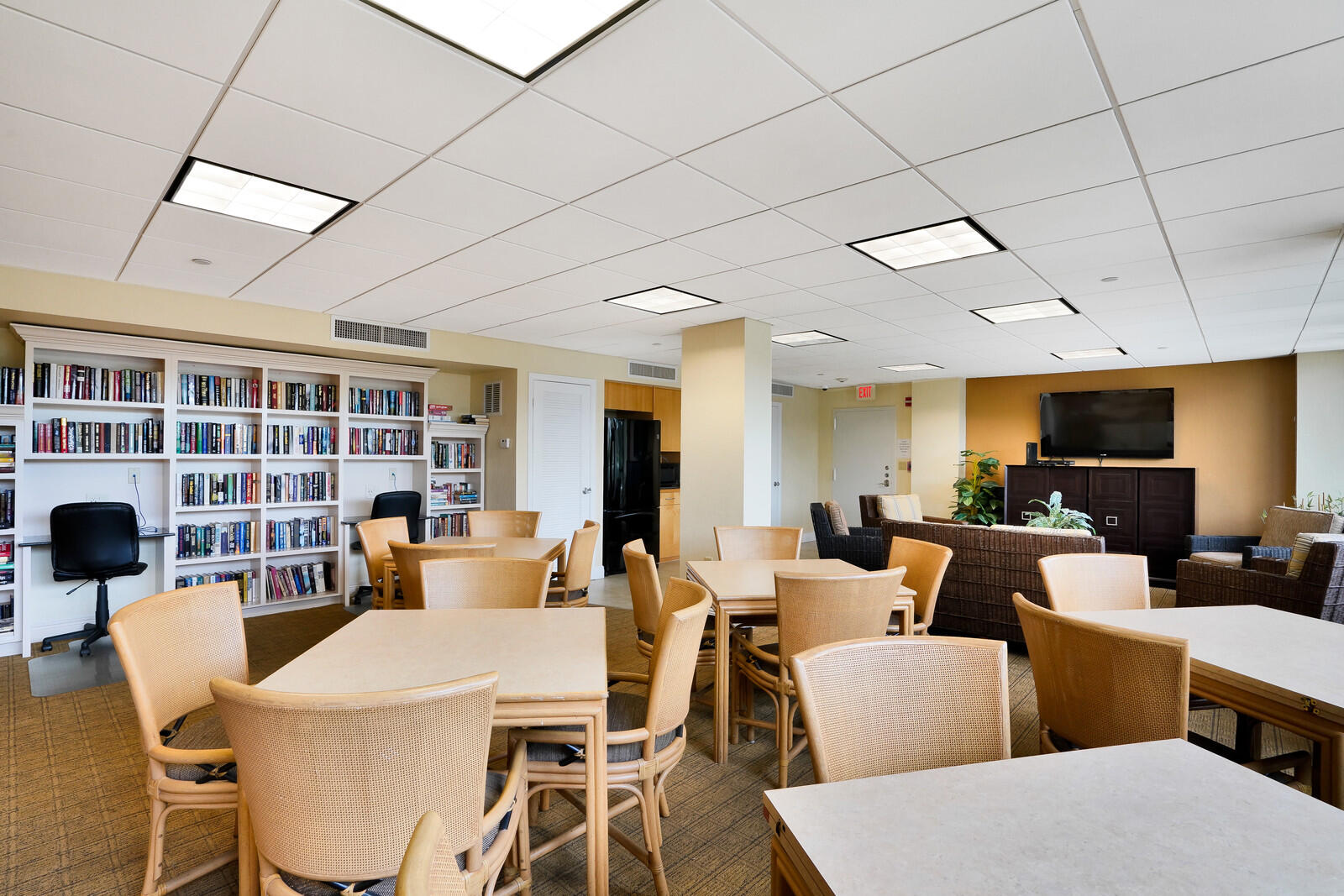 4200 North Ocean Drive, Unit 11601 Singer Island, FL 33404 - Photo 55 of 56 a living room with furniture a dining table and a floor to ceiling window