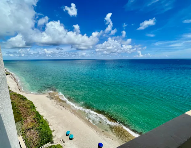 a view of a balcony with an outdoor space