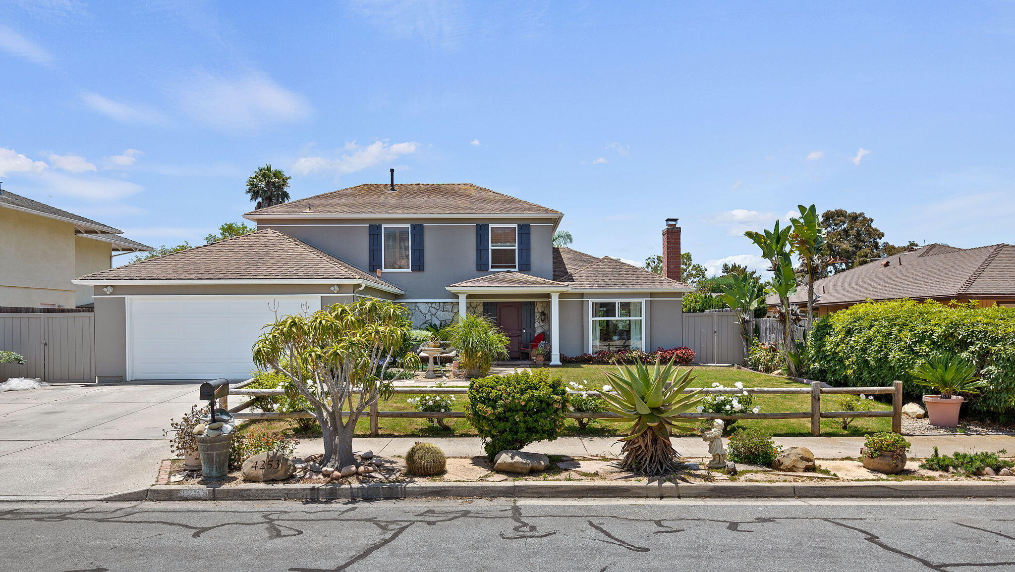 front view of a house with a small yard