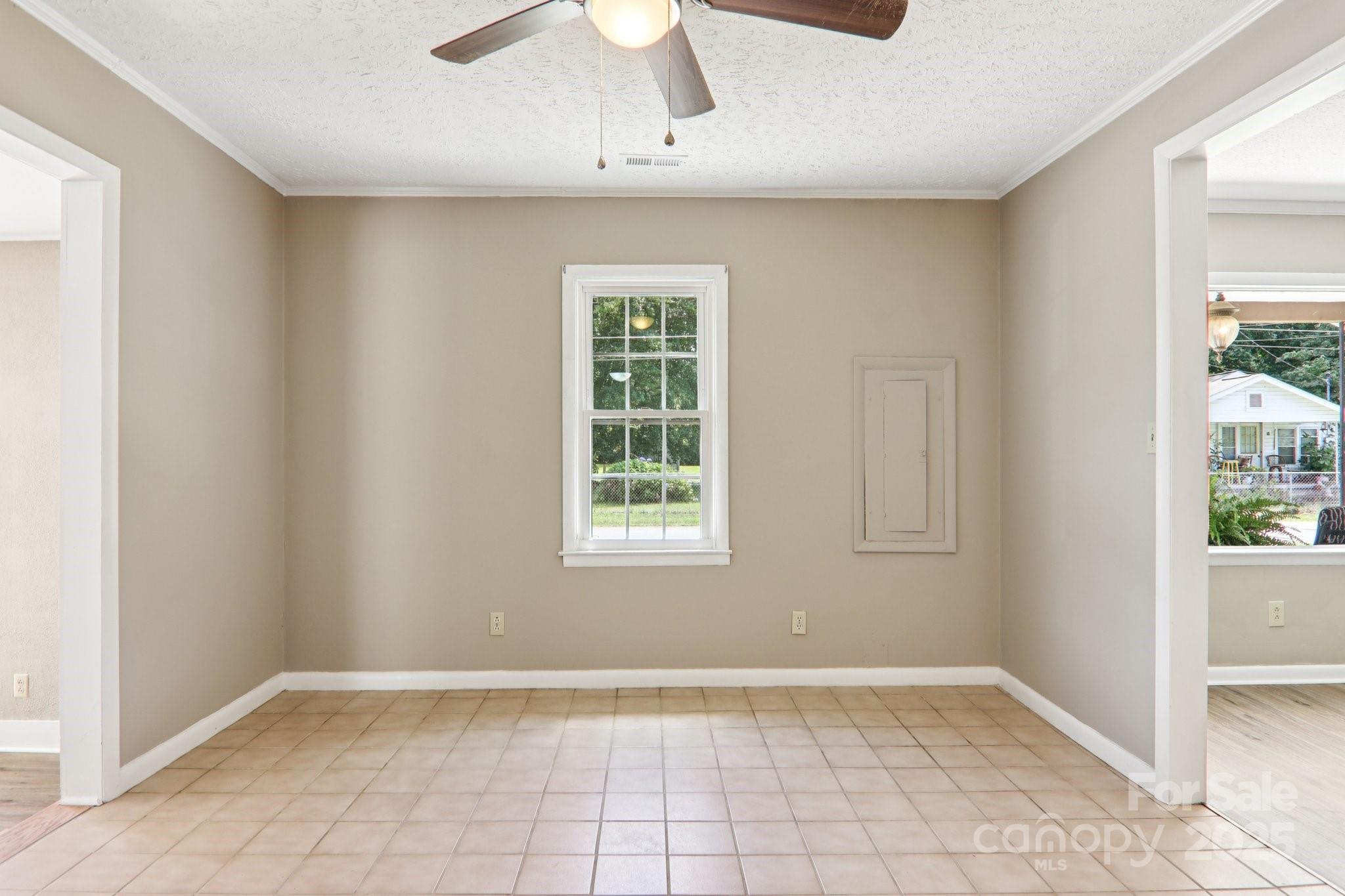 55 Polk Street Waynesville, NC 28786 - Photo 13 of 44 an empty room with windows