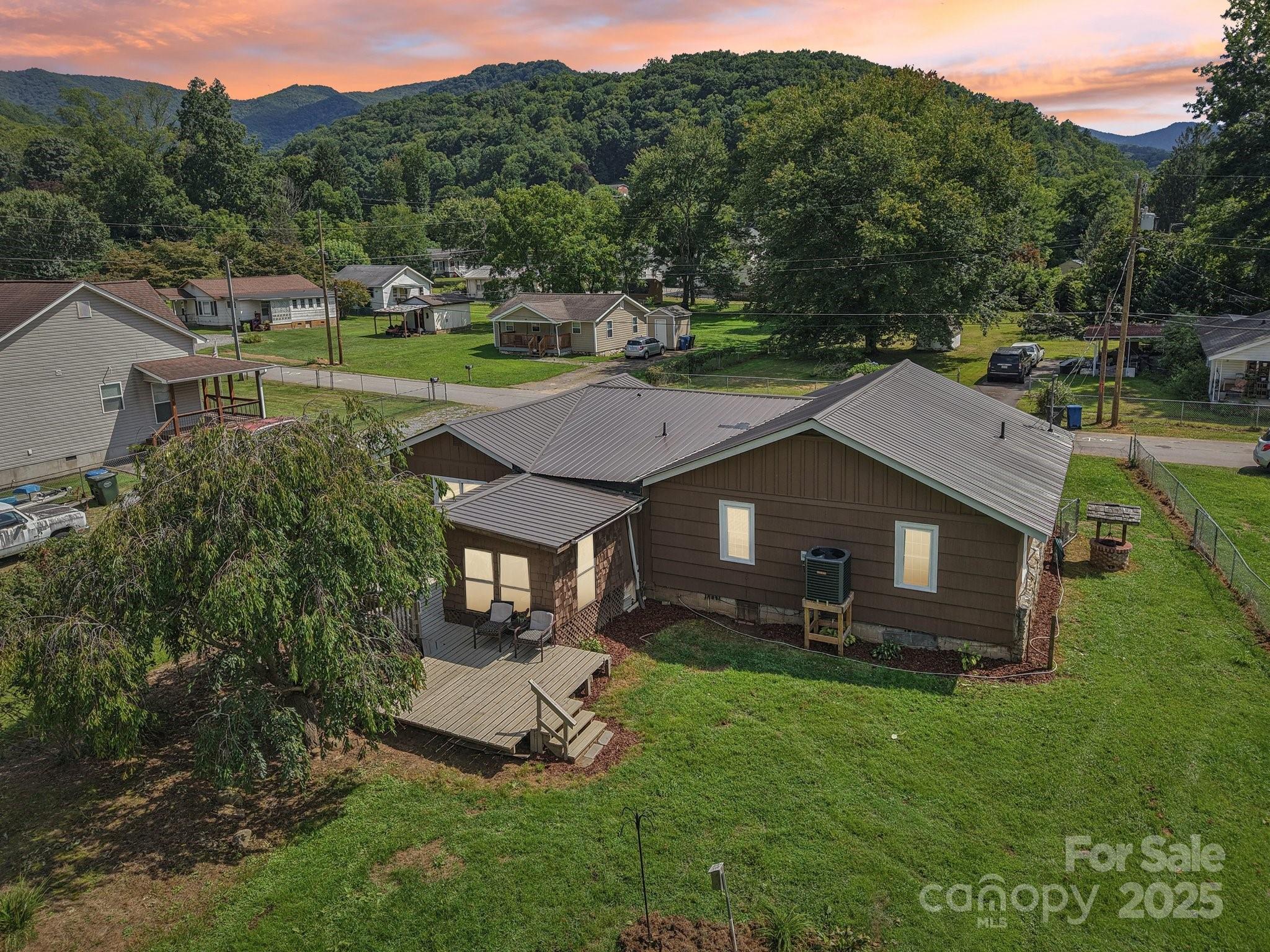 55 Polk Street Waynesville, NC 28786 - Photo 43 of 44 an aerial view of a house with a garden