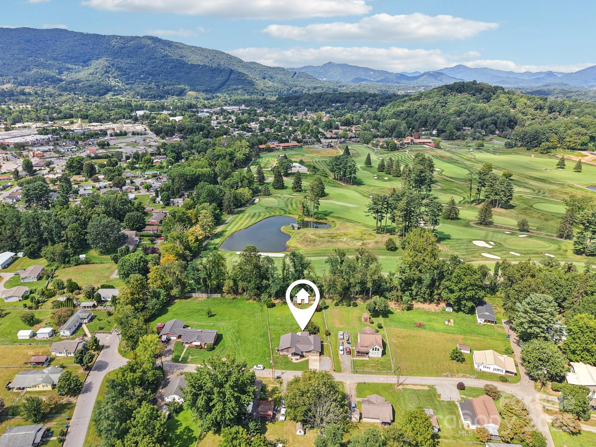 55 Polk Street Waynesville, NC 28786 - Photo 6 of 44 a view of a garden