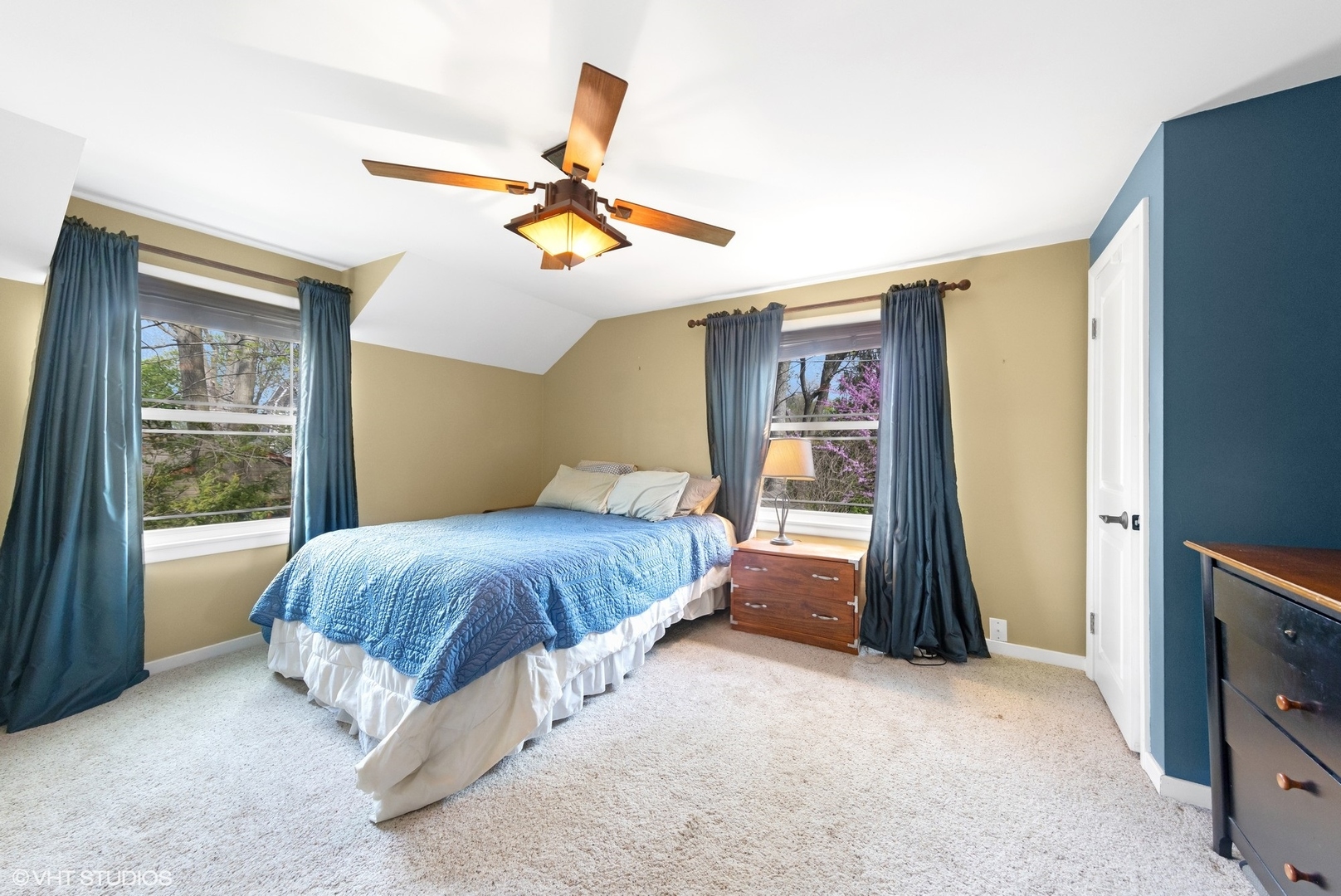 424 Hill Street Downers Grove, IL 60515 - Photo 7 of 19 a spacious bedroom with a bed and a window