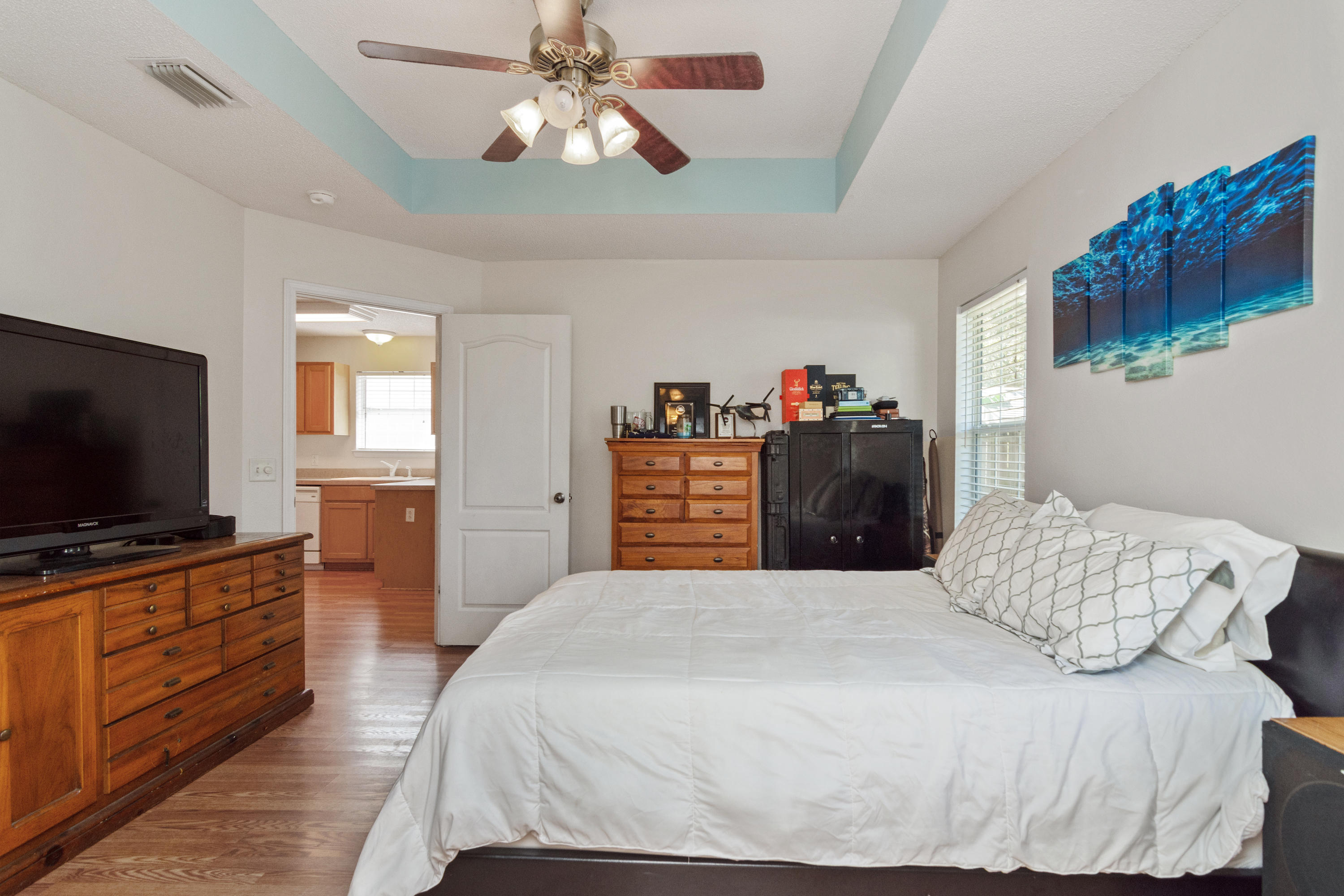 1845 Brick Circle Fort Walton Beach, FL 32547 - Photo 12 of 24 a bedroom with a bed and a flat screen tv