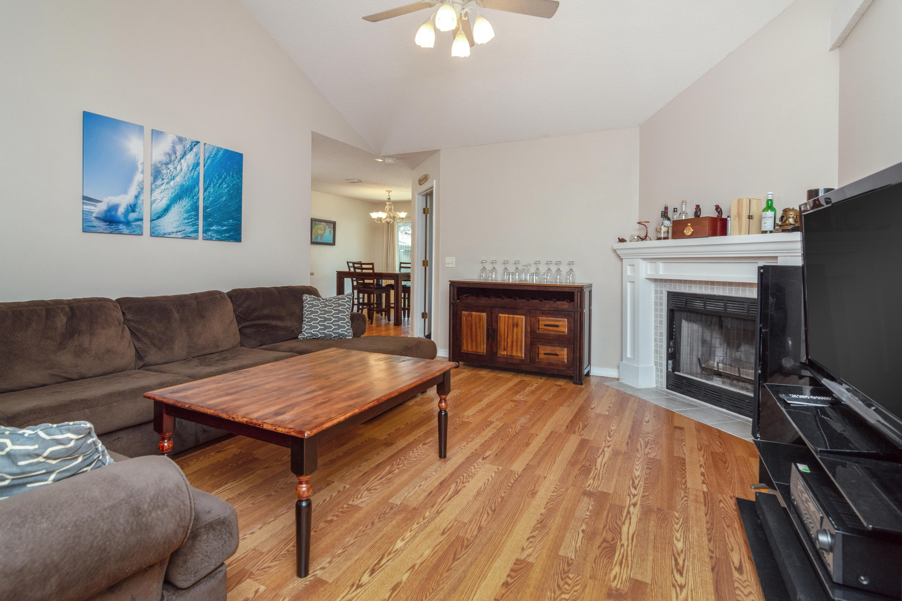 1845 Brick Circle Fort Walton Beach, FL 32547 - Photo 3 of 24 a living room with furniture and a fireplace