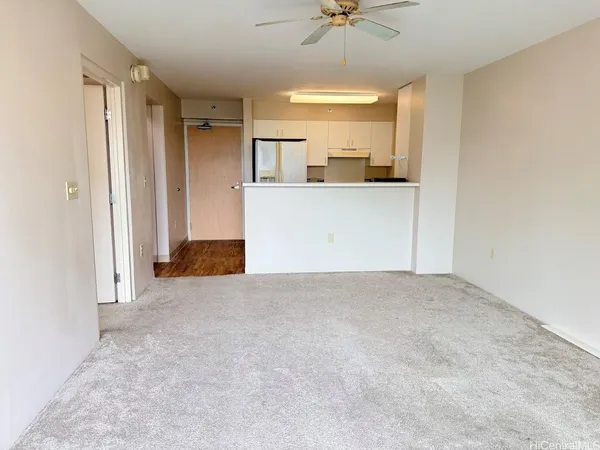a view of a kitchen and a window