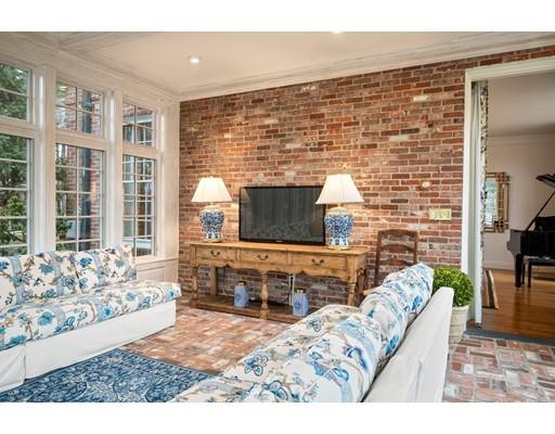 219 Dedham Street Dover, MA 02030 - Photo 11 of 30 a living room with a couch and a table