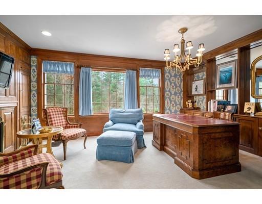 219 Dedham Street Dover, MA 02030 - Photo 12 of 30 a living room with furniture and a chandelier