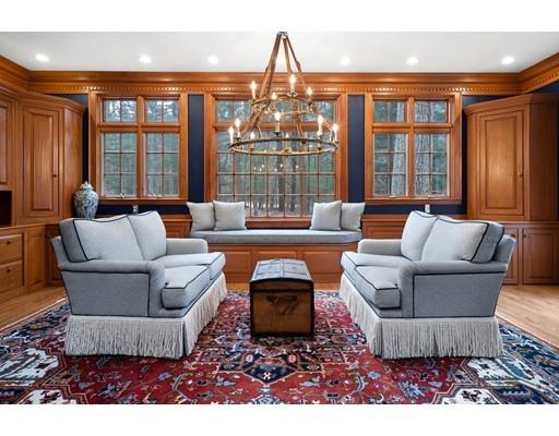 219 Dedham Street Dover, MA 02030 - Photo 17 of 30 a living room with furniture and a chandelier