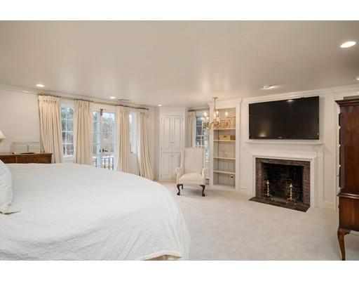 219 Dedham Street Dover, MA 02030 - Photo 22 of 30 a living room with furniture and a fireplace