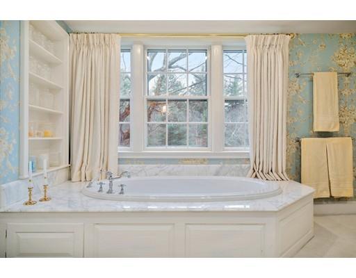 219 Dedham Street Dover, MA 02030 - Photo 24 of 30 a bathroom with a granite countertop sink a large mirror and a window