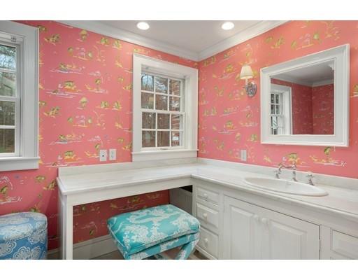 219 Dedham Street Dover, MA 02030 - Photo 27 of 30 a bathroom with a sink a vanity and a mirror