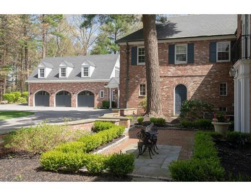 219 Dedham Street Dover, MA 02030 - Photo 3 of 30 a house with garden in front of it