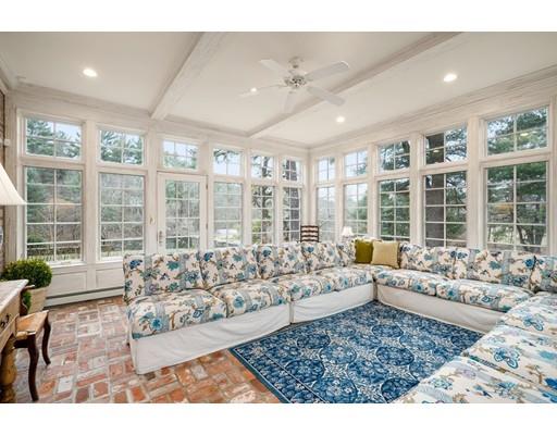 219 Dedham Street Dover, MA 02030 - Photo 10 of 30 a living room with furniture large windows and wooden floor
