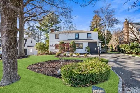 a view of a house with garden