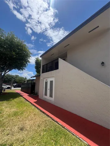 a view of an outdoor space and swimming pool