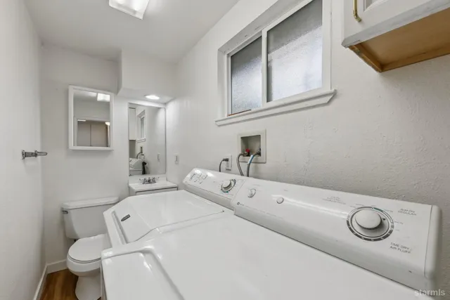 a view of an empty room and a window