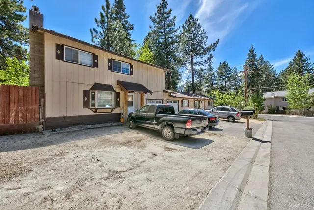 a view of street with parked cars