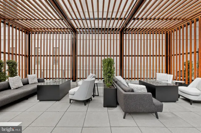 a view of a living room and bathroom