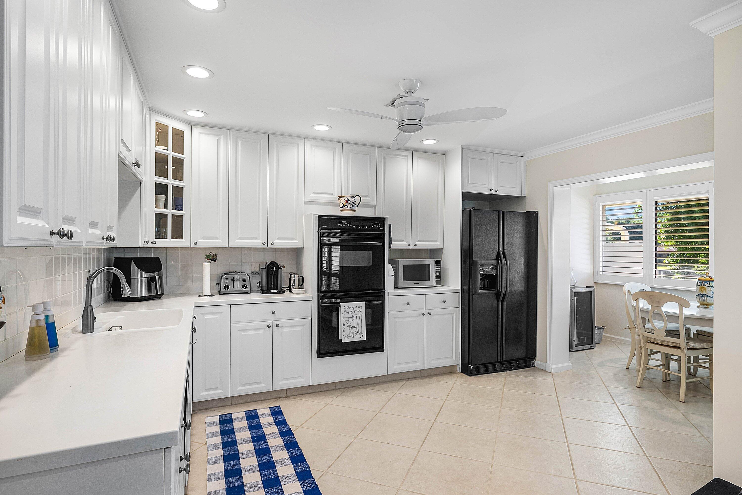 3641 North Quail Ridge Drive, Unit BOBWHITE A Boynton Beach, FL 33436 - Photo 6 of 57 Kitchen