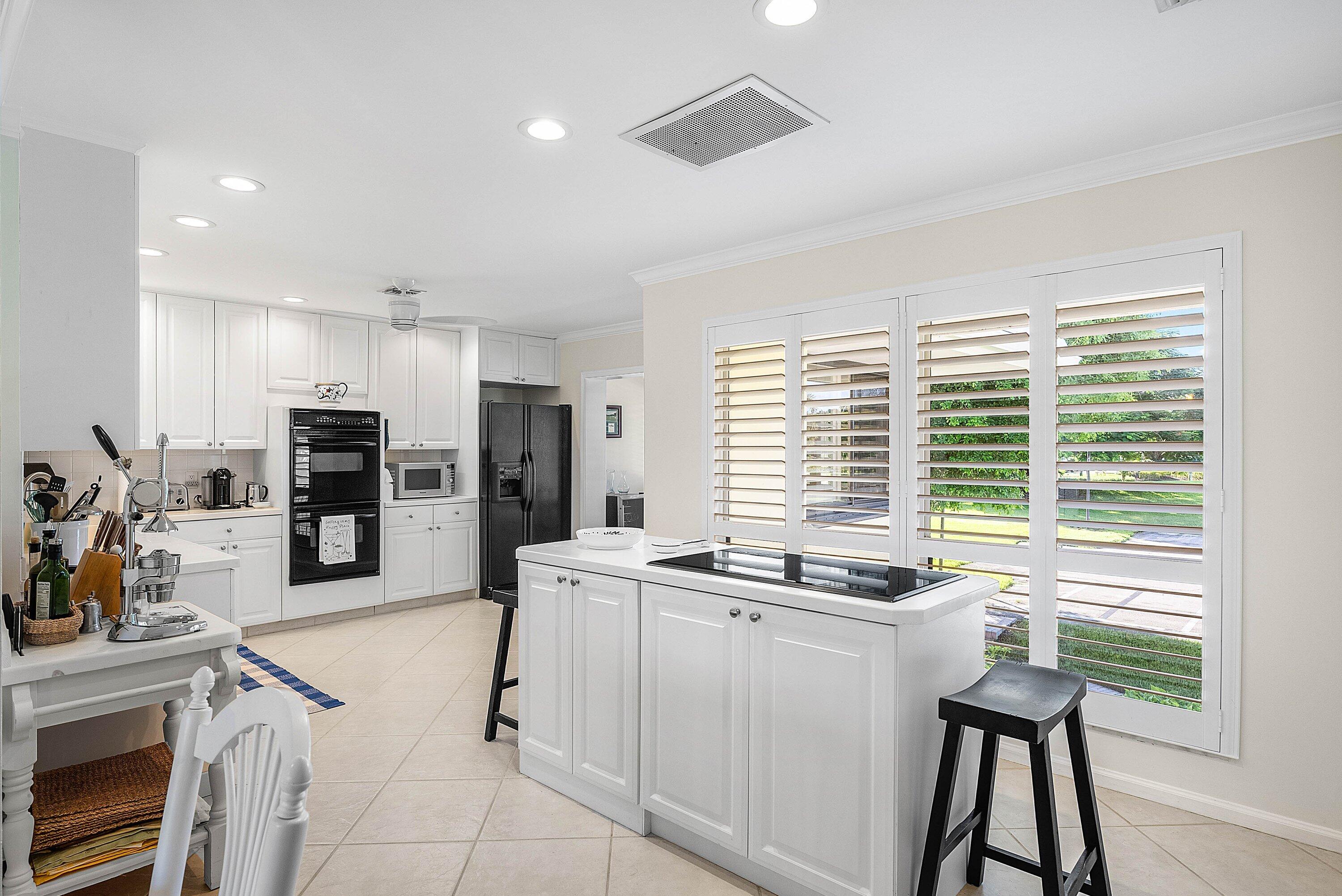 3641 North Quail Ridge Drive, Unit BOBWHITE A Boynton Beach, FL 33436 - Photo 7 of 57 Kitchen