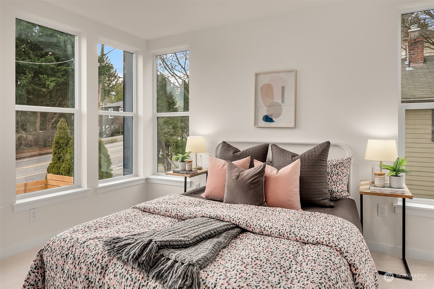 2216 Northeast 75th Street Seattle, WA 98115 - Photo 11 of 23 a bedroom with a large bed and a large window